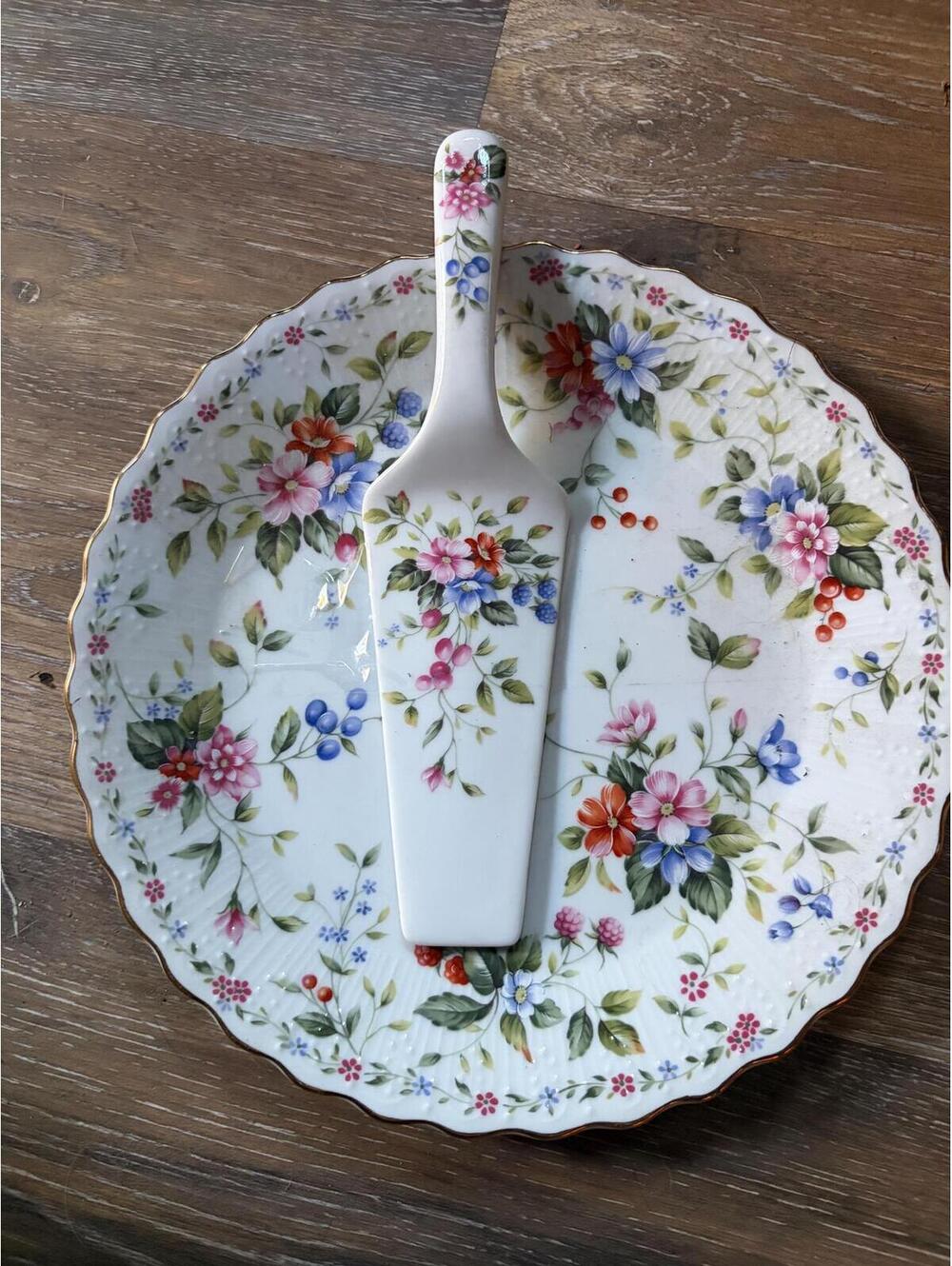 A Noble Excellence floral and berries ceramic cake plate and server set.